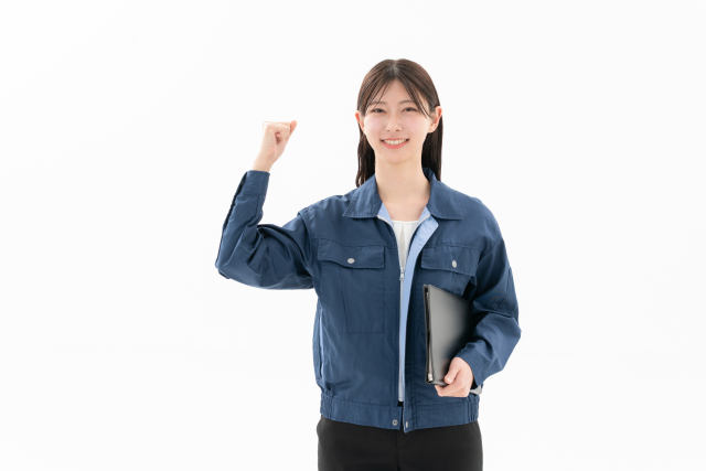 ガッツポーズをする笑顔の女性